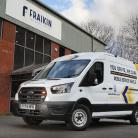 Fraikin-branded van parked outside of a Fraikin-branded building