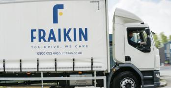 White rigid truck with the Fraikin logo on the side